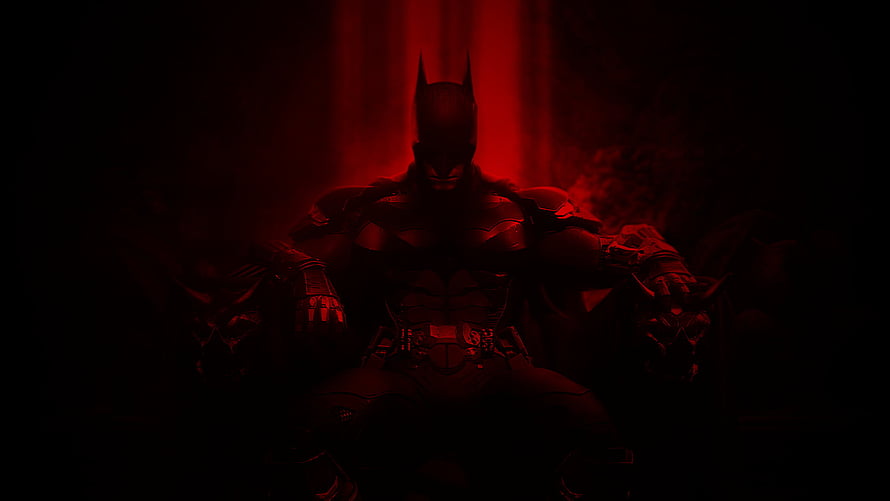 Batman in Dark Red Armor Seated in Dramatic Shadow HD wallpaper