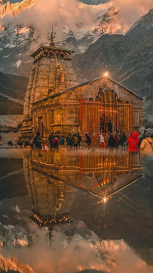 Kedarnath Temple at Golden Hour with Snow-Capped Himalayan Peaks and Reflection HD phone wallpaper