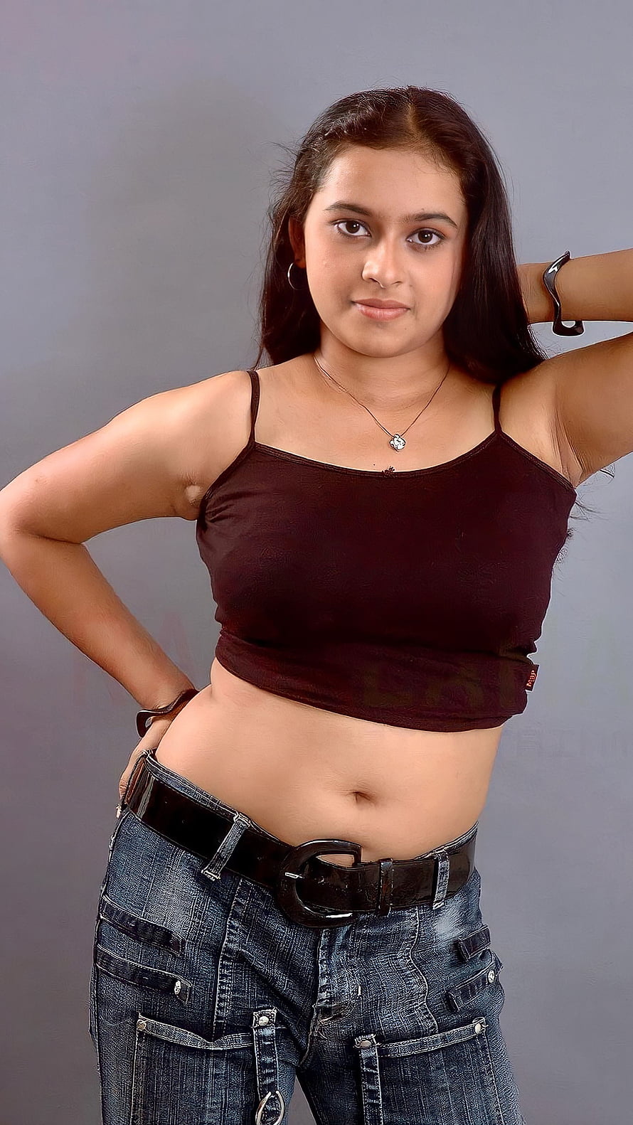 Srividya Tamil Actress in Dark Crop Top and Denim Jeans HD phone wallpaper