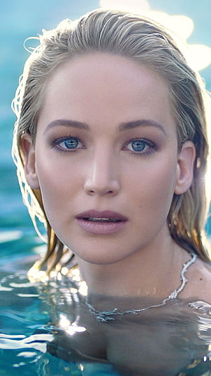 Jennifer Lawrence Close-Up Portrait in Water with Wet Blonde Hair and Blue Eyes HD phone wallpaper