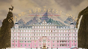 The Grand Budapest Hotel Pink Facade with Mountain Backdrop and Deer Statue HD wallpaper