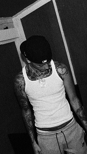 Central Cee in Black and White Streetwear Portrait with Tattoos and Cap HD phone wallpaper