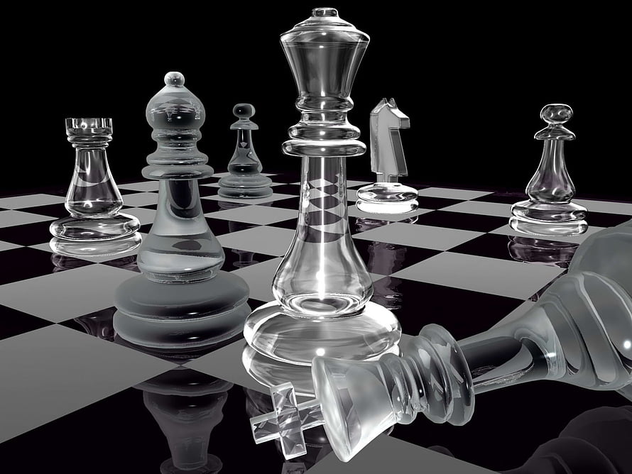 Transparent Glass Chess Pieces on a Reflective Black and White Board HD wallpaper