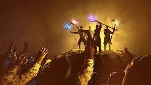 Black Ops 3 Zombies: Silhouetted Figures Holding Glowing Staves Above a Crowd HD wallpaper