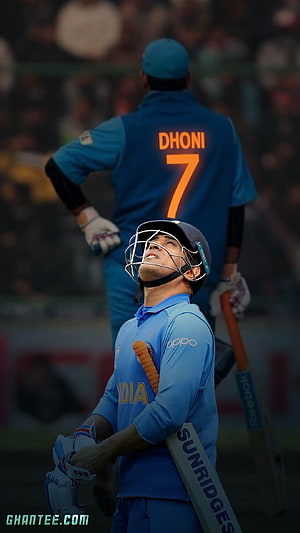 MS Dhoni Cricket Player in India Blue Jersey Holding SunRiders Bat on the Field HD phone wallpaper