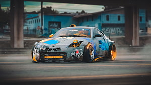 Custom Nissan 350Z Drift Build with Graffiti Livery and Widebody Kit HD wallpaper