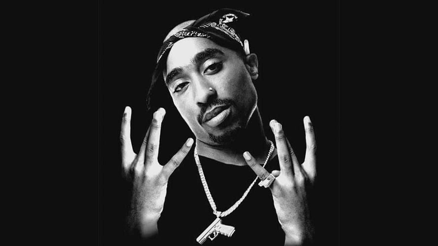 Tupac Shakur Black and White Portrait with Bandana and Gun Pendant Necklace HD wallpaper