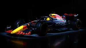 Red Bull Racing Oracle RB18 Formula 1 Car in Dark Studio Setting HD wallpaper