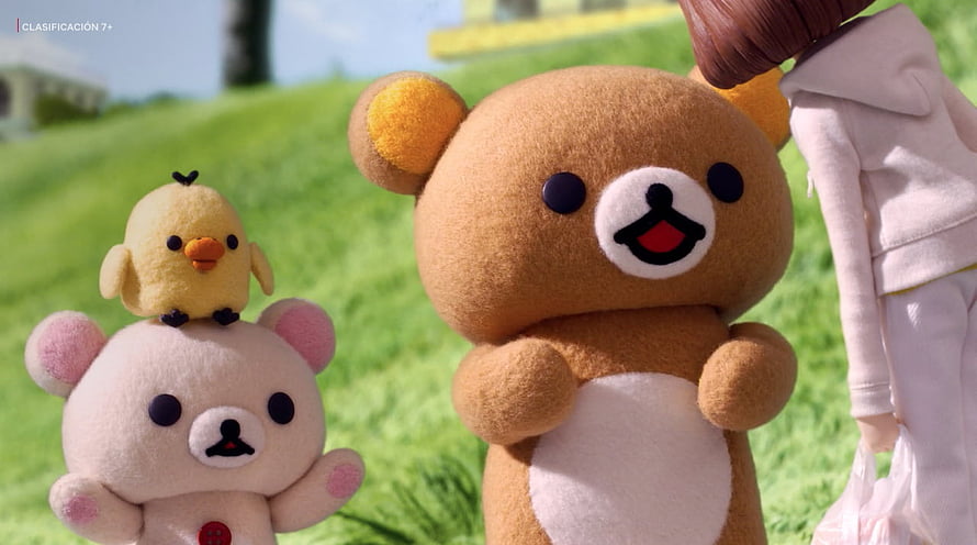 Rilakkuma and Kiiroitori plush characters in a sunny green meadow HD wallpaper