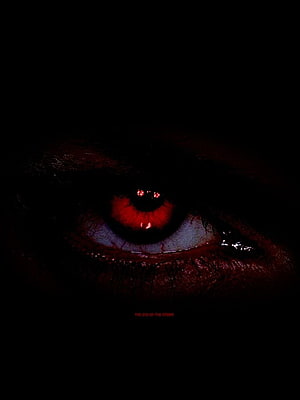 Glowing Red Eye in Darkness with Intense Horror Atmosphere HD phone wallpaper