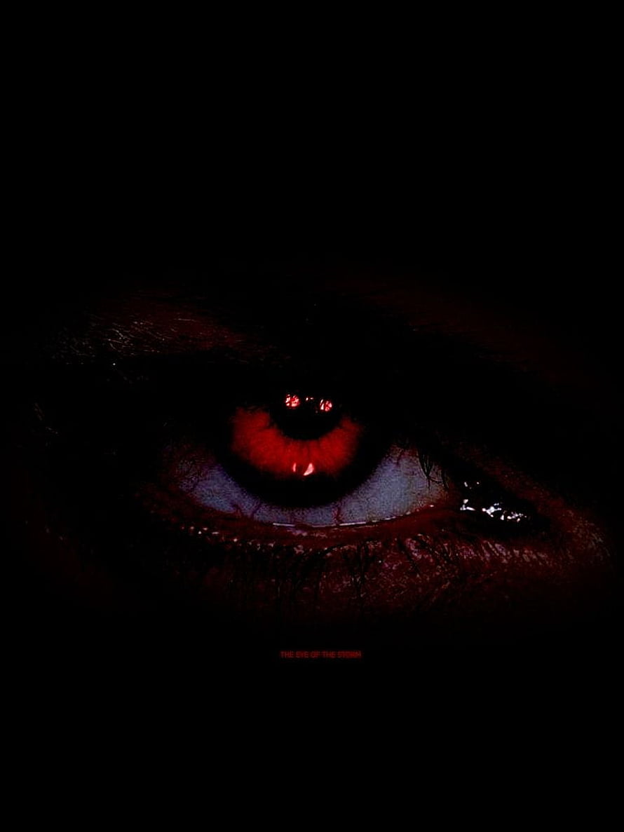 Glowing Red Eye in Darkness with Intense Horror Atmosphere HD phone wallpaper