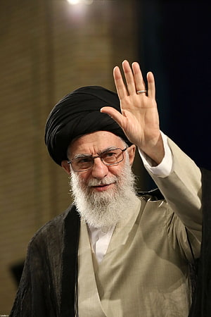 Ayatollah Ali Khamenei Waving in Traditional Attire and Turban HD phone wallpaper