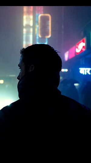 Blade Runner Silhouette in Neon-Lit Night City HD phone wallpaper
