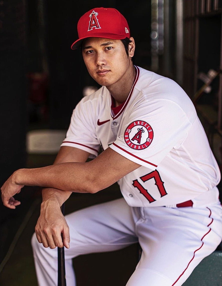 Shohei Ohtani in Los Angeles Angels Home Uniform Sitting in the Dugout HD phone wallpaper