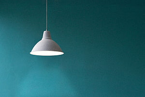 White Pendant Lamp Against Teal Wall Minimalist Interior Lighting Design HD wallpaper