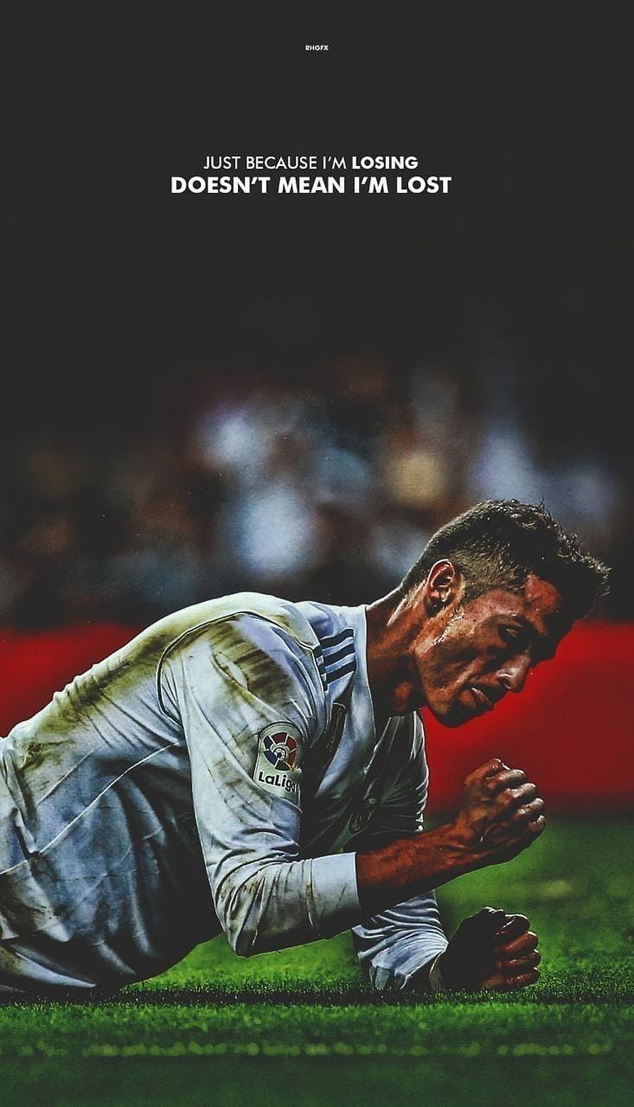Cristiano Ronaldo Kneeling on the Pitch in Real Madrid Kit with Motivational Quote HD phone wallpaper