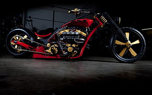 Custom Red and Gold Chopper Motorcycle with Exposed Engine in Dark Garage HD wallpaper