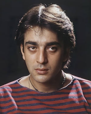 Sanjay Dutt Portrait in Red and Blue Striped Shirt with Dark Background HD phone wallpaper