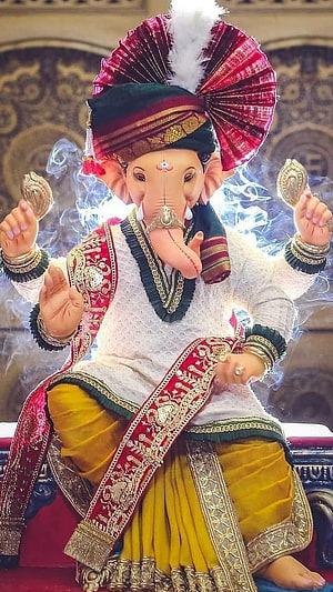 Ornate Ganesha Idol in Traditional Attire with Elaborate Turban and Gold Jewelry HD phone wallpaper