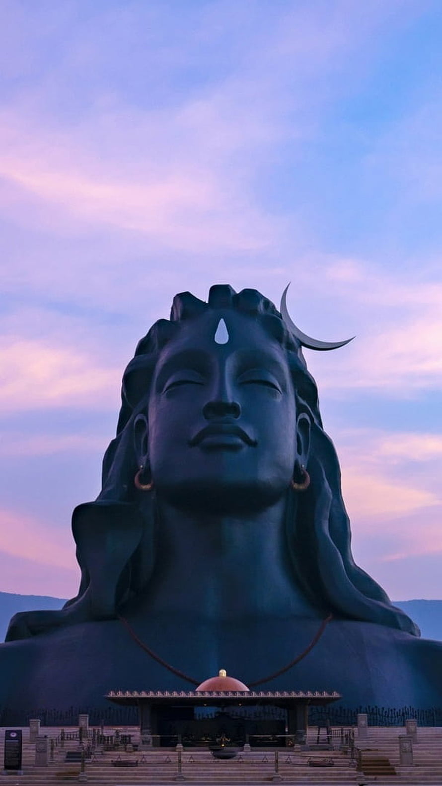 Adiyogi Statue at Dawn: Serene Lord Shiva Sculpture Under a Pastel Sky HD phone wallpaper
