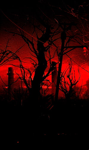 Eerie Red Night Scene with Dead Trees and Silhouetted Structures HD phone wallpaper