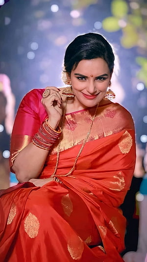 Swetha Menon in a Traditional Red Silk Saree with Gold Jewelry and Bangles HD phone wallpaper