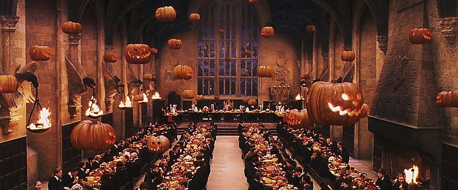 Hogwarts Great Hall Halloween Feast with Floating Jack-O-Lanterns and Candlelight HD wallpaper
