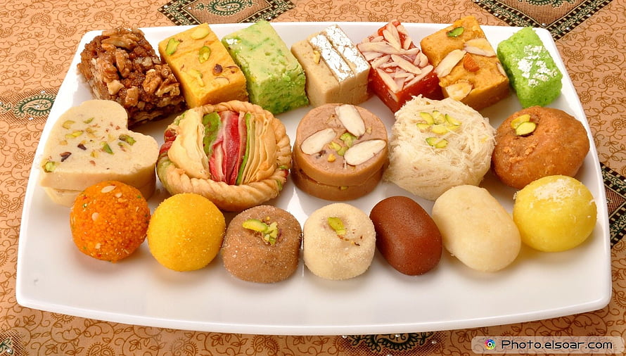 Assorted Indian Mithai Sweets Platter with Nuts and Pistachios HD wallpaper