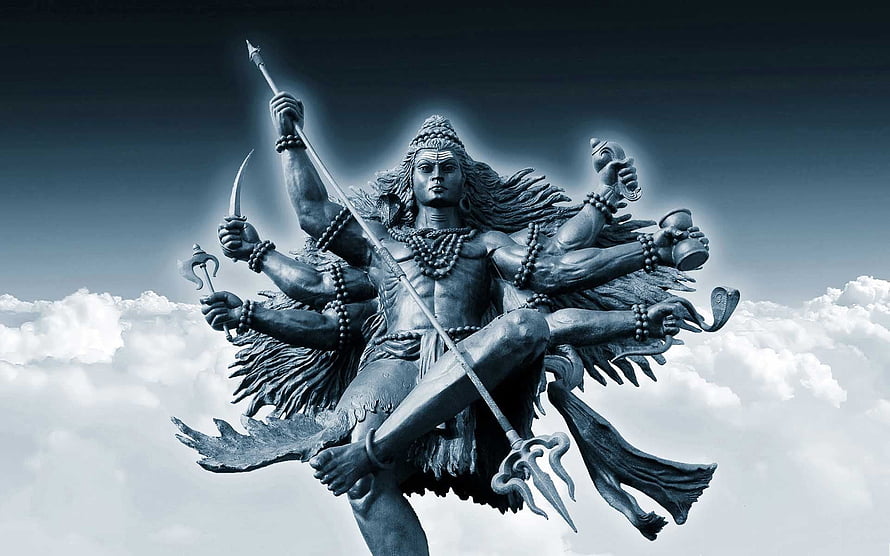 Lord Shiva Tandav Statue With Trident And Multiple Arms Against Cloudy Sky HD wallpaper