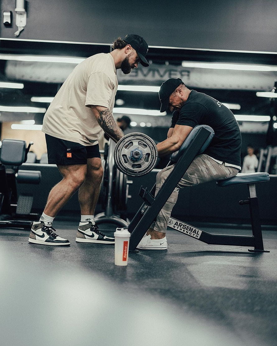 Cbum Assisting Weightlifting Partner During Intense Gym Session HD phone wallpaper