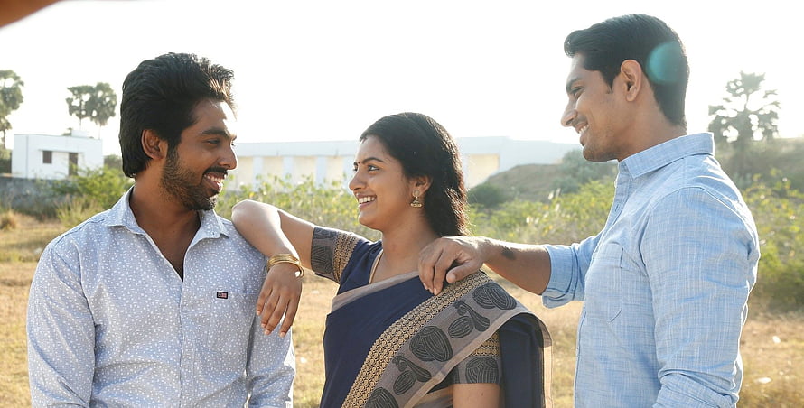 Sivappu Manjal Pachai Movie Still Featuring Three Characters in a Sunlit Field HD wallpaper