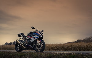 BMW S1000RR Sport Bike Parked on Rural Road at Golden Hour Sunset HD wallpaper