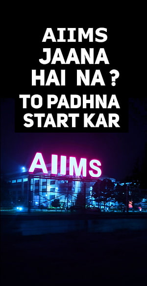 AIIMS Delhi Campus Building at Night with Neon Signage and Hindi Text Overlay HD phone wallpaper
