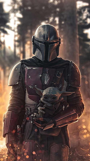 The Mandalorian and Grogu in a Forest Setting from Star Wars HD phone wallpaper