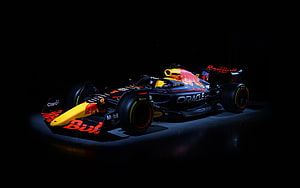 Red Bull Racing RB18 Formula 1 car in dramatic dark studio lighting with Oracle and Mobil 1 branding HD wallpaper
