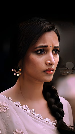 Srinidhi Shetty Portrait in White Saree with Traditional Jewelry and Braided Hair HD phone wallpaper
