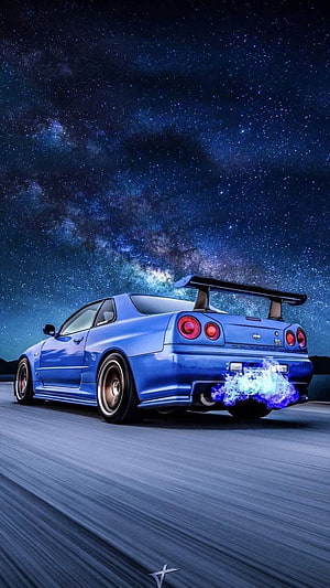 Blue Nissan Skyline GT-R R34 drifting with blue flames under a starry night sky HD phone wallpaper