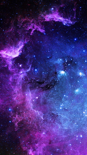 Vibrant Purple and Blue Cosmic Nebula with Scattered Stars and Deep Space Dust HD phone wallpaper