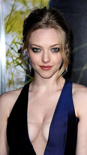Amanda Seyfried in a Deep V-Neck Halter Gown at a Red Carpet Event HD phone wallpaper