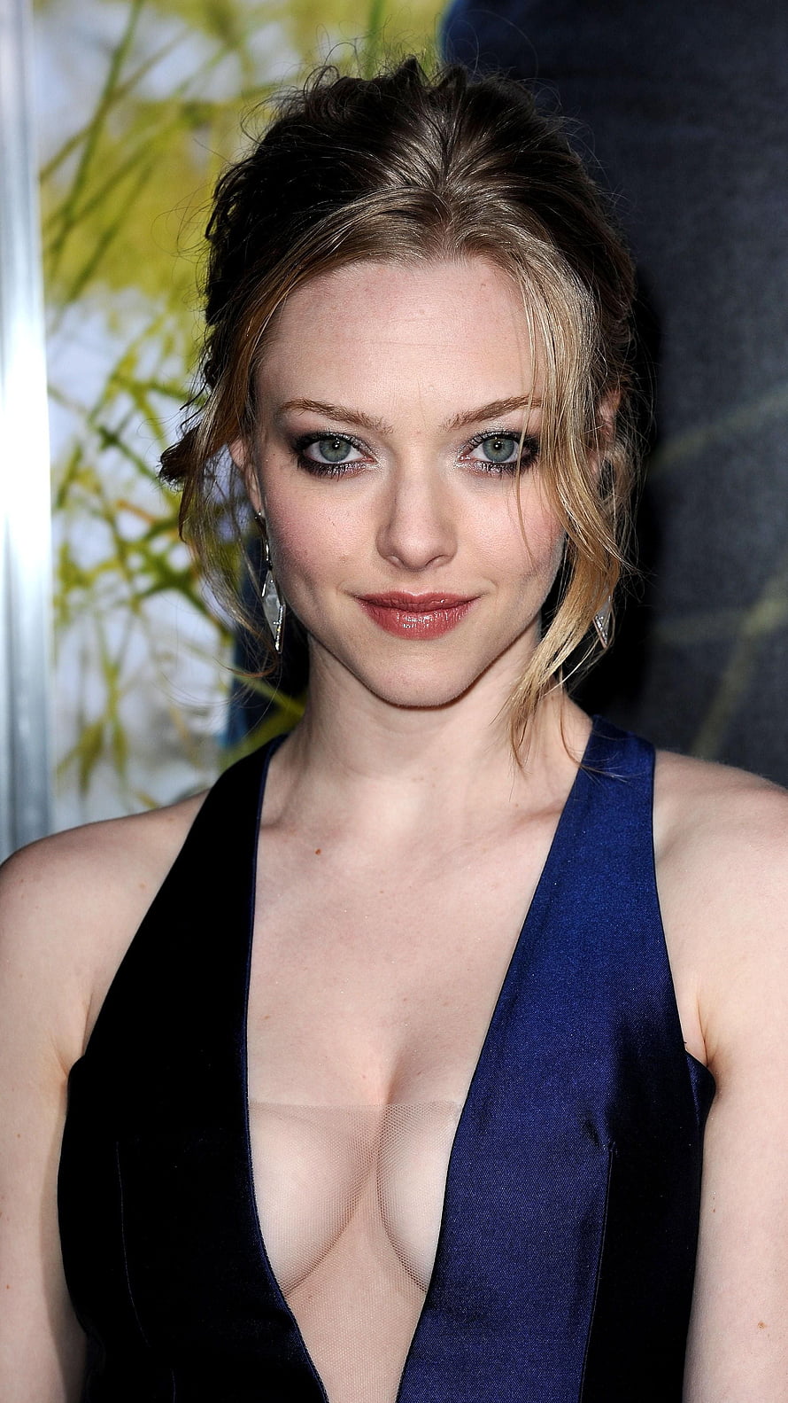 Amanda Seyfried in a Deep V-Neck Halter Gown at a Red Carpet Event HD phone wallpaper