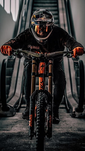 Fabio Wibmer Riding Orange Mountain Bike in Urban Setting HD phone wallpaper