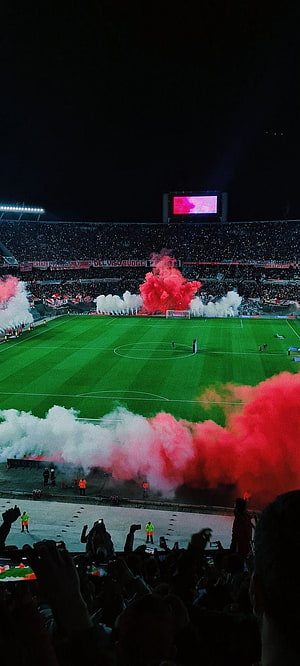 River Plate Estadio Monumental Night Match with Red and White Flares HD phone wallpaper