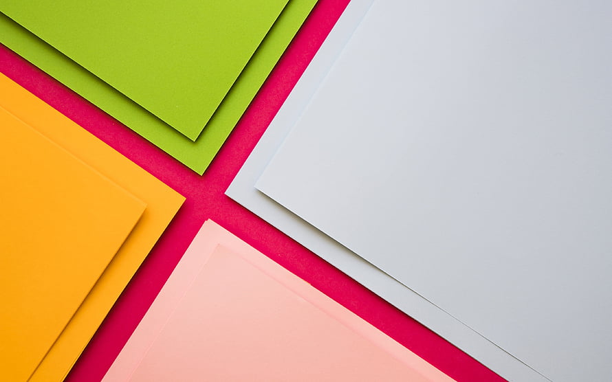 Vibrant Geometric Composition with Layered Colorful Paper Sheets on Pink Background HD wallpaper