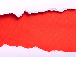 Vibrant Red Torn Paper Texture with Rough White Edges on Clean Background HD wallpaper