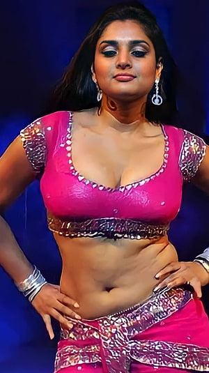 Ramya in a vibrant pink traditional dance costume with intricate silver embroidery and jewelry HD phone wallpaper