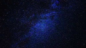 Milky Way Galaxy Spanning Deep Space with Dense Star Fields and Cosmic Nebulae HD wallpaper