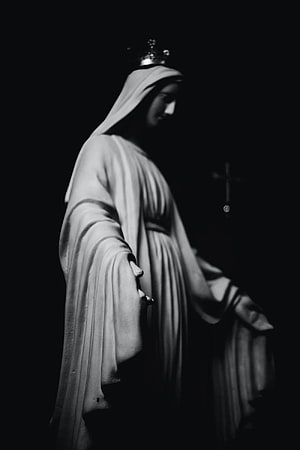 Monochrome Virgin Mary Statue With Crown And Cross In Dramatic Shadow HD phone wallpaper