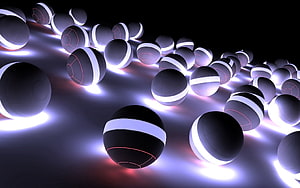 Glowing 3D Spheres with Neon Bands on a Dark Reflective Surface HD wallpaper