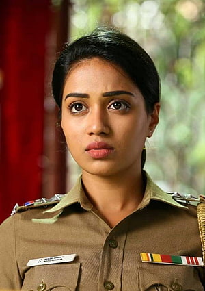 Nivetha Pethuraj in Indian Police Uniform with Medal Ribbons and Shoulder Insignia HD phone wallpaper