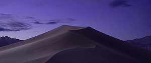 Purple Tinted Sand Dune Landscape at Dusk with Distant Mountains HD wallpaper